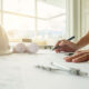 hands of engineer working on blueprint,construction concept. eng